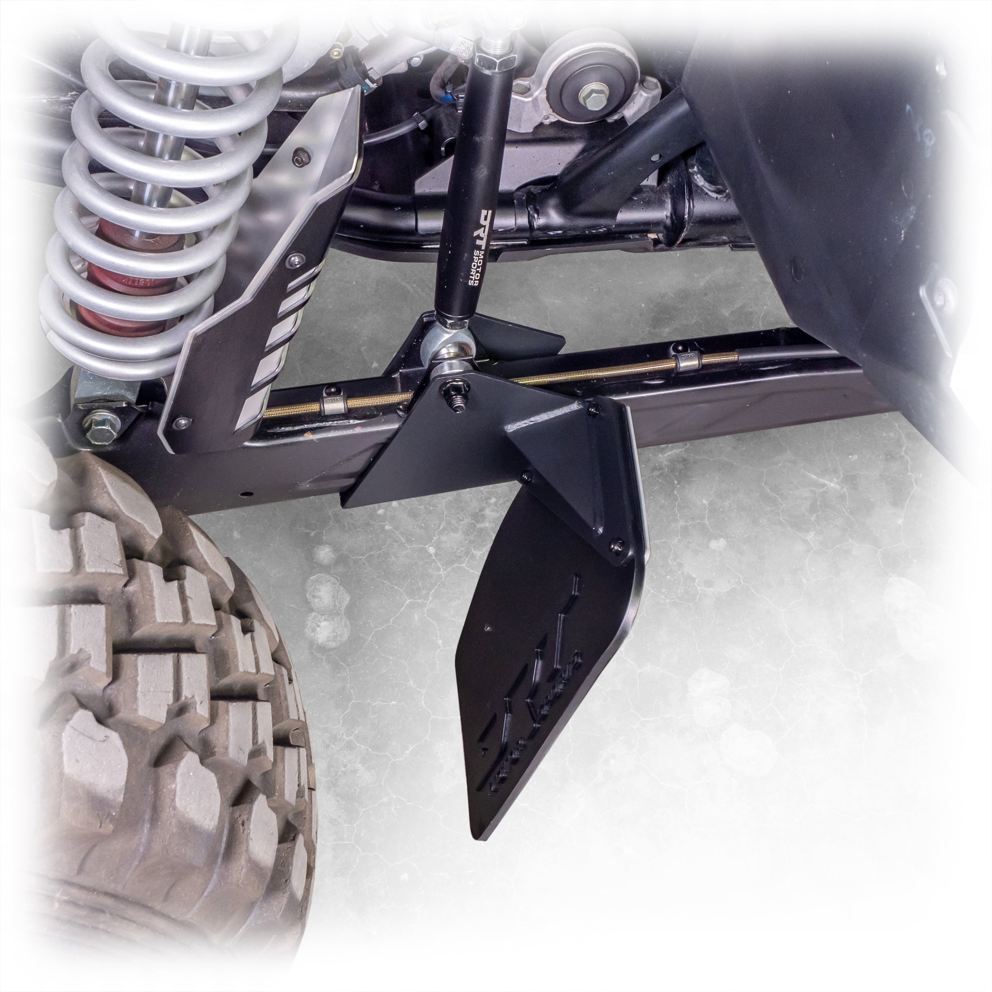 Bolt-on rock guard mount on trailing arm of Polaris RZR Pro XP