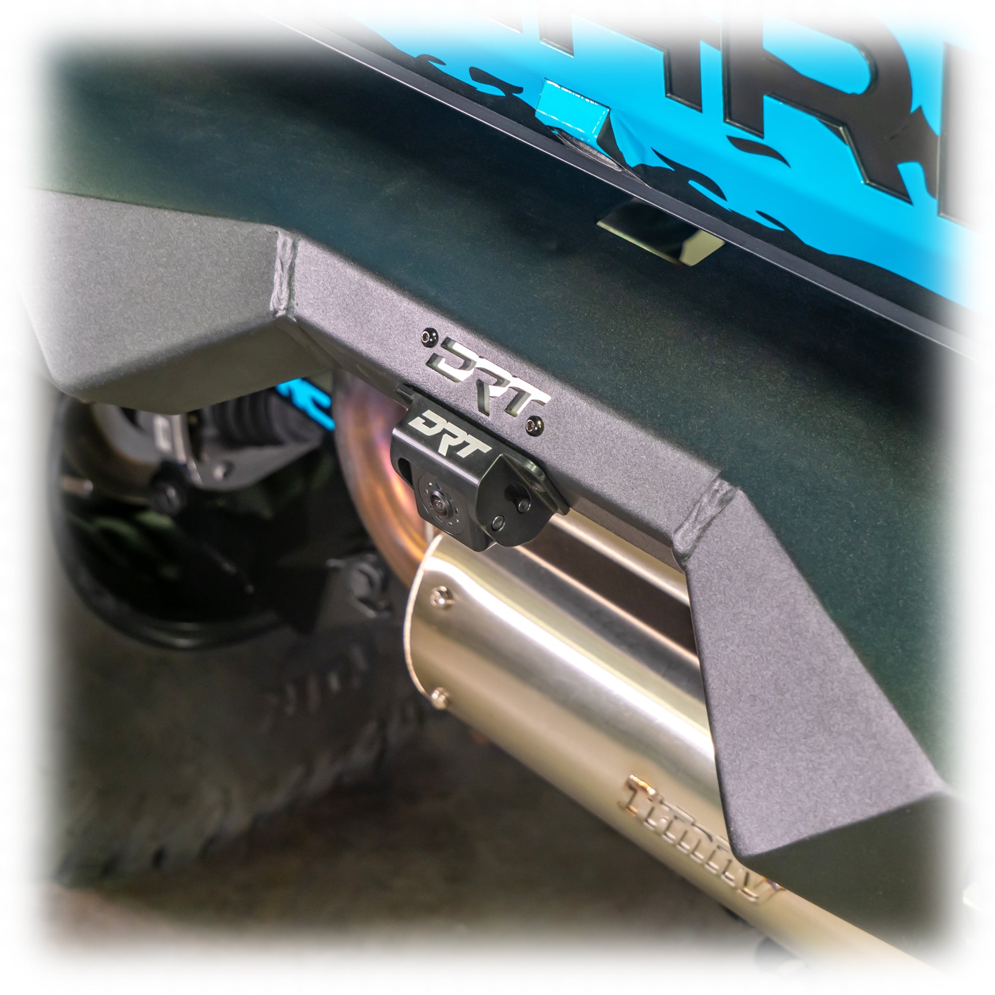 Close up of adjustable bracket for relocating a Polaris rear camera