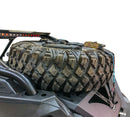 Spare tire storage bag sitting inside inverted off road wheel